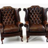 PAIR GEORGIAN-STYLE BROWN LEATHER WINGBACK ARMCHAIRS, by Whittle Bros. of Warrington, button-