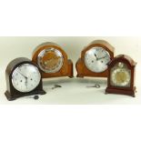 FOUR 20TH CENTURY MANTEL CLOCKS, comprising two 1930s Smiths clocks in walnut and bakelite cases,