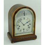 WINTERHALDER & HOFFMEISTER MANTEL CLOCK, mahogany and boxwood strung arched case with strike/