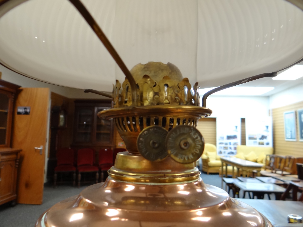 ARTS & CRAFTS BRASS AND COPPER STANDARD OIL LAMP, with foliate decorated tripod base and column, - Image 9 of 20