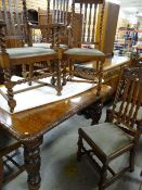 JACOBEAN-STYLE OAK DINING TABLE with leaf carved moulded edge and turned legs, together with six