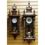 TWO DECORATIVE GERMAN VIENNA-STYLE WALL CLOCKS, one stained pen work floral case, two part roman