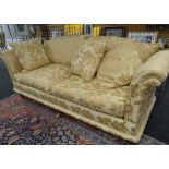 DAVID GUNDRY LARGE DROP-END OR KNOLE SOFA, 'Florence' model, in gold floral damask fabric, 234 x 107