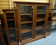 19TH CENTURY OAK BREAKFRONT BOOKCASE, four glazed doors, adjustable shelves, cornice and plinth