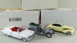 THREE FRANKLIN MINT DIECAST 1:24 SCALE MODEL CARS, comprising Rolls Royce Silver Ghost 1907, Cord