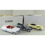 THREE FRANKLIN MINT DIECAST 1:24 SCALE MODEL CARS, comprising Rolls Royce Silver Ghost 1907, Cord