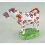 SWANSEA CAMBRIAN POTTERY COW CREAMER, iron red and pink lustre splashed decoration with black detail