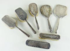 ASSORTED EDWARDIAN SILVER BACKED BRUSHES & HAND MIRRORS, engine turned and floral engraved