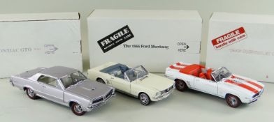 THREE DANBURY MINT 1:24 SCALE DIECAST MODEL CARS, comprising Pontiac GTO 1965, Ford Mustang 1966,