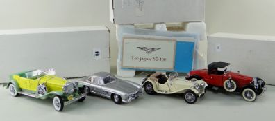 FOUR FRANKLIN MINT DIECAST 1:24 SCALE MODEL CARS, comprising Jaguar SS100 1938, Mercedes Benz