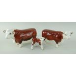 BESWICK POTTERY HEREFORD CATTLE FAMILY comprising 'CH of Champions' gloss bull, 11.5cms high, and