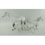 FOUR BESWICK POTTERY DAPPLE GREY HORSES comprising large gloss racehorse, 28.5cms high, gloss