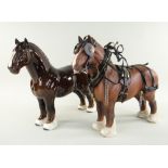 TWO BESWICK POTTERY SHIRE HORSES comprising 'CH Burnham Beauty' in show harness, brown matt, model