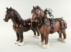 TWO BESWICK POTTERY SHIRE HORSES comprising 'CH Burnham Beauty' in show harness, brown matt, model