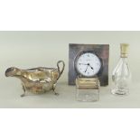 GROUP OF SILVER ITEMS, comprising sauce boat, modern R J Carr desk clock, glass jar and glass