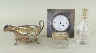 GROUP OF SILVER ITEMS, comprising sauce boat, modern R J Carr desk clock, glass jar and glass