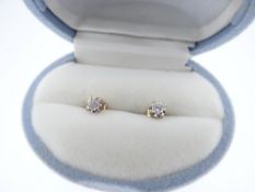 PAIR OF DIAMOND ILLUSION SET 10K GOLD EARSTUDS (boxed)