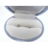 PAIR OF DIAMOND ILLUSION SET 10K GOLD EARSTUDS (boxed)