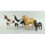 FOUR BESWICK POTTERY PONIES comprising gloss Skebald pinto pony, glos Piebald pinto pony, gloss