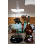 EDWARDIAN BRASS & VASELINE GLASS OIL LAMP and a copper clad brown glass flask (2)