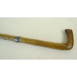 VICTORIAN RHINOCEROS HORN WALKING CANE, carved to imitate briar, mounted with a white metal collar