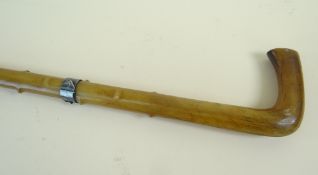 VICTORIAN RHINOCEROS HORN WALKING CANE, carved to imitate briar, mounted with a white metal collar
