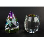 TWO SWAROVSKI CRYSTAL PAPERWEIGHTS including Rio Cone vitriol light paperweight and a Revolution (