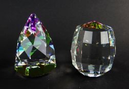 TWO SWAROVSKI CRYSTAL PAPERWEIGHTS including Rio Cone vitriol light paperweight and a Revolution (