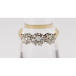 18CT GOLD THREE-STONE DIAMOND RING, the three claw set stones totalling 1.0cts approximately (visual
