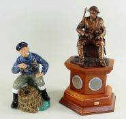 TWO COLLECTABLE FIGURINES including Royal Doulton Lobster Man HN2317, 17.5cms high and Danbury