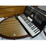 VINTAGE ARISTON BELL PIANO ACCORDION, 3.5 octaves in Bakelite case, with oval mirror (2)