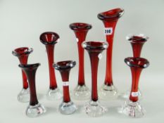 ASSORTED SWEDISH ART GLASS 'BONE' VASES, all in shades of red, various sizes, all with bubble bases,