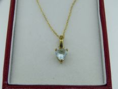 9CT GOLD & AQUAMARINE DROP PENDANT NECKLACE, heart shaped claw mounted stone in a hallmarked mount