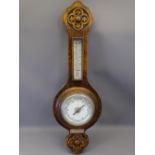 OAK FRAMED ANEROID BAROMETER WITH THERMOMETER, attached presentation plaque reads 'Won by J G Evans,