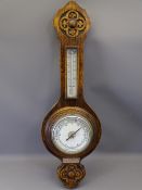 OAK FRAMED ANEROID BAROMETER WITH THERMOMETER, attached presentation plaque reads 'Won by J G Evans,