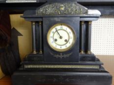 VICTORIAN BLACK MARBLE MANTEL CLOCK, typically architectural, the enamel dial set with Arabic