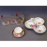 A MINIATURE ROYAL CROWN DERBY CUP & SAUCER, each piece Numbered 7112 with green stamp, Royal Crown