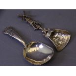 DUTCH SILVER CADDY SPOON with figure decoration to the bow and a windmill handle, 0.6ozs and a plain