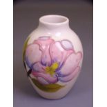 MOORCROFT MAGNOLIA 9CMS H VASE, cream ground baluster form with impressed factory marks to the base