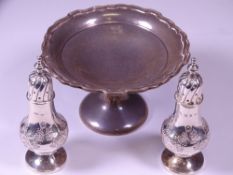 SMALL SILVER, THREE ITEMS including a pair of baluster form pepper pots with floral embossed