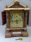 CARVED OAK TWIN FUSEE PRESENTATION MANTEL CLOCK circa 1890, the dial set with Roman numerals,