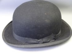 A GENTLEMAN'S BOWLER HAT with supply label W P Lewis, London House, Old Colwyn