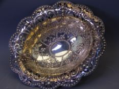 OVAL FLORAL SPECKLED & PIERCED DISH on four supports, 4.2ozs, London 1894