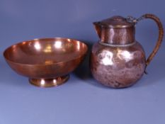 KESWICK SCHOOL INDUSTRIAL ART COPPER LIDDED JUG together with a dish engraved with sea monsters