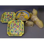 A SMALL ITALIAN POTTERY FIGURAL BOWL, a pair of yellow ground floral square Cloisonne dishes (