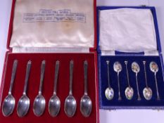 CASED SILVER TEASPOONS, TWO SETS, including six enamel decorated teaspoons, the bowls having various