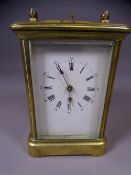 FRENCH BRASS CASED REPEATING CARRIAGE CLOCK, unmarked white dial set with Roman numerals (no key),