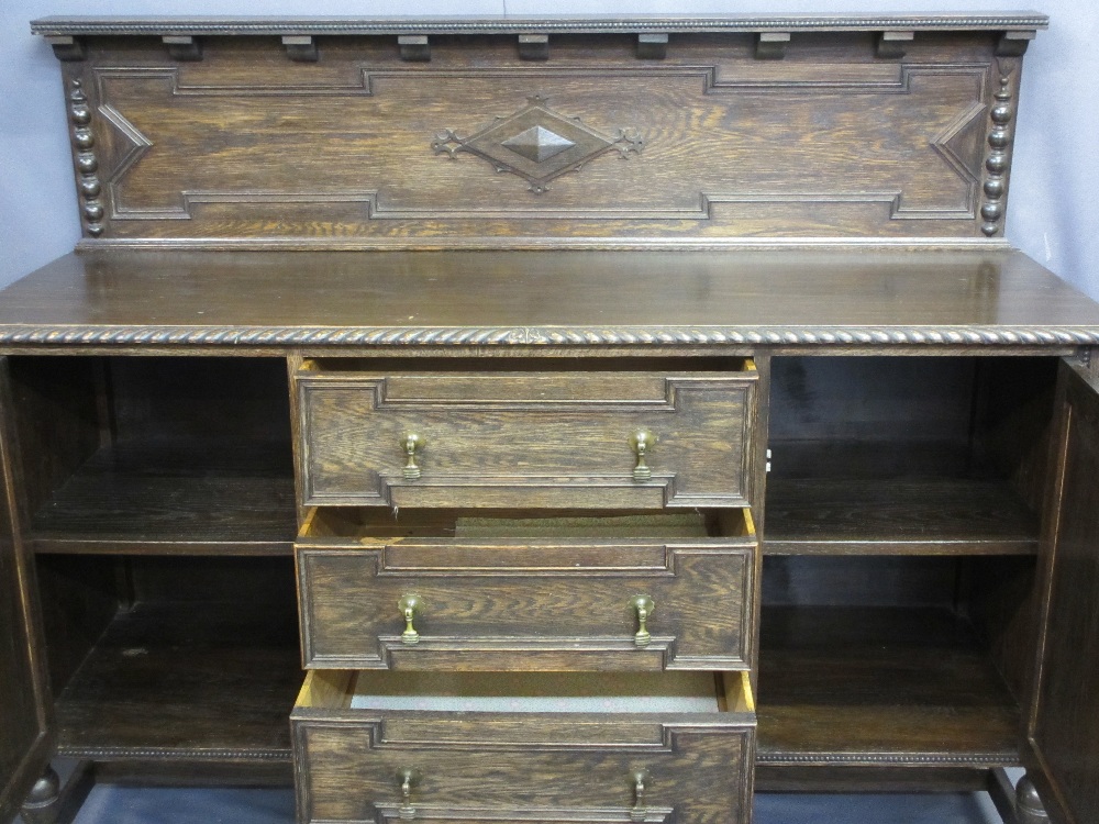 OAK CARVED RAILBACK SIDEBOARD with three central drawers and two flanking cupboards, 137cms H, - Image 2 of 4