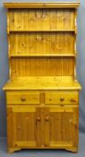 PINE DRESSER of compact design, two shelves over base with two drawer and two cupboard doors, 180cms