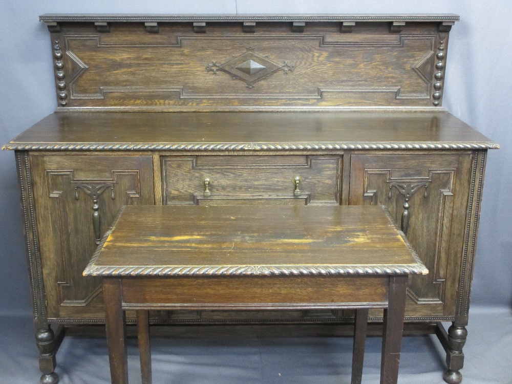 OAK CARVED RAILBACK SIDEBOARD with three central drawers and two flanking cupboards, 137cms H,